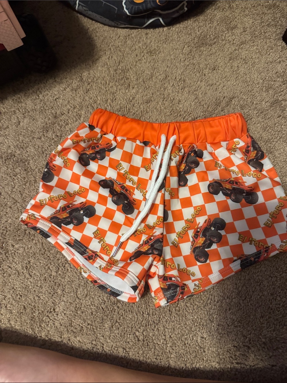 Orange Checkered 'El Toro Loco' Monster Truck Swim Shorts
